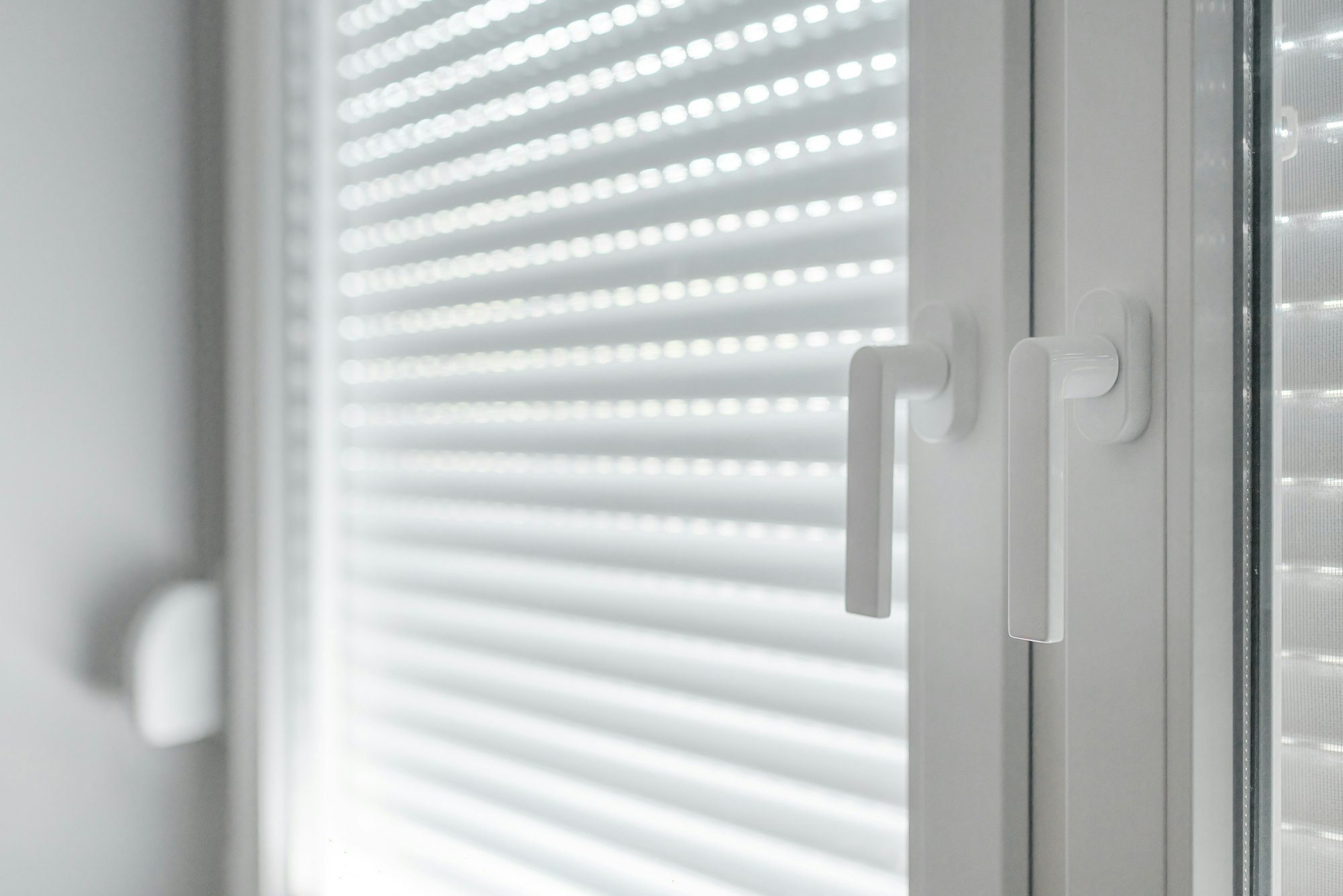 White PVC window handles, selective focus